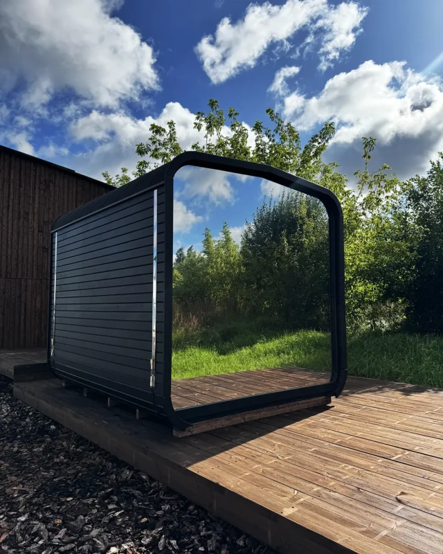 Thermowood sauna with mirrored window