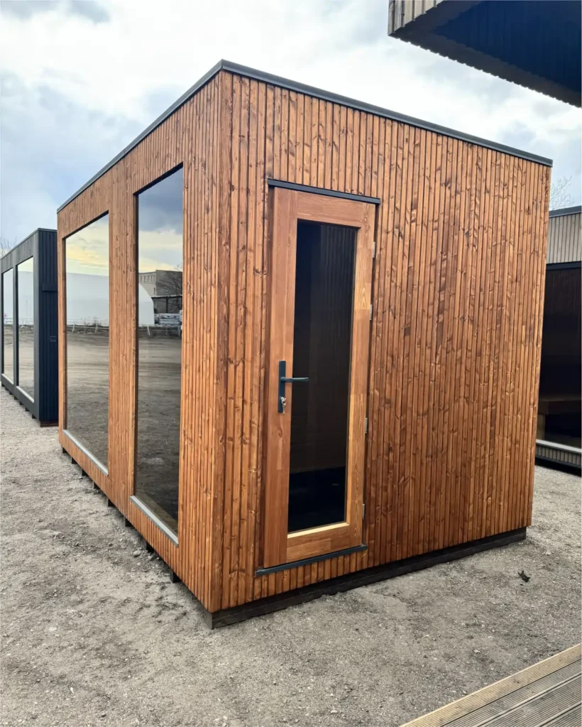 Wooden exterior door with tinted glass and lock.