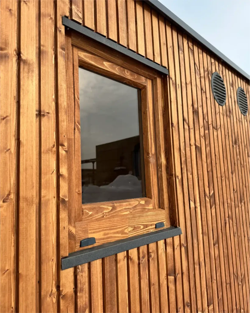 13:32 Openable sauna window, 50 × 60 cm, spruce wood frame.