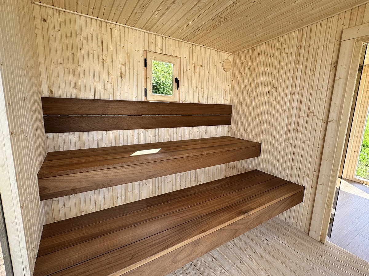 TAVO Panoramic Sauna Comfort M with Dual L-Glass sauna interior with two-tier thermo wood benches