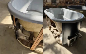 Integrated FLAT wood-fired heater installed beneath the insert of a Maudis Ofuro two-person hot tub.